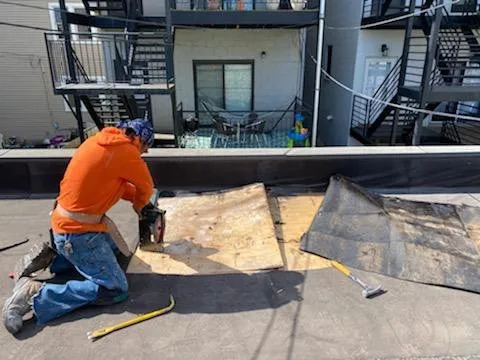 Slide of Second City Flat Roofs