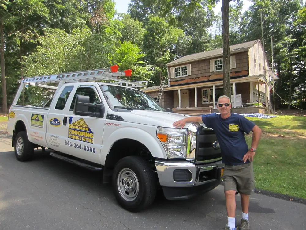 Slide of Segelman Shaw Roofing Siding & Gutter