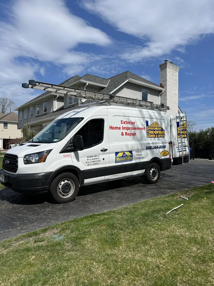 Slide of Segelman Shaw Roofing Siding & Gutter