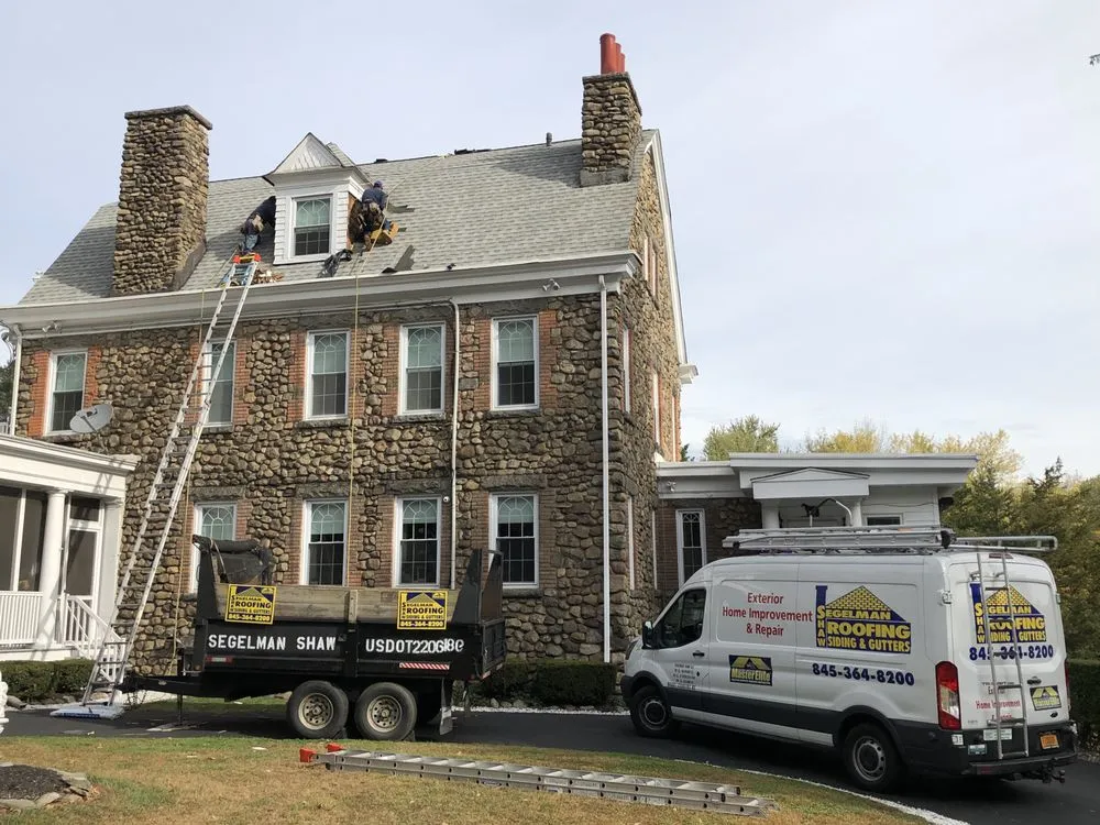 Slide of Segelman Shaw Roofing Siding & Gutters