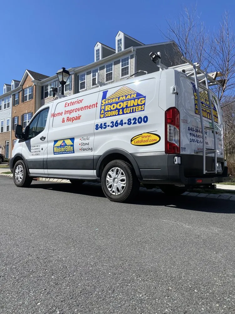 Slide of Segelman Shaw Roofing Siding & Gutters