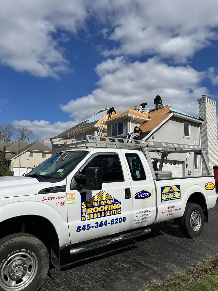 Slide of Segelman Shaw Roofing Siding & Gutters