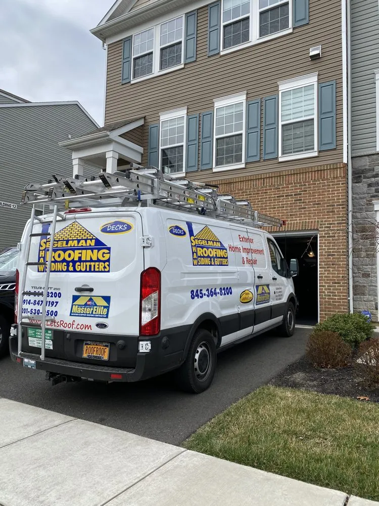 Slide of Segelman Shaw Roofing Siding & Gutters