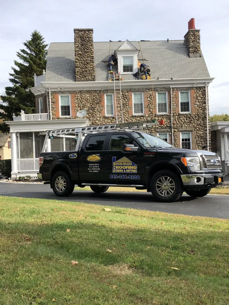 Slide of Segelman Shaw Roofing Siding & Gutters