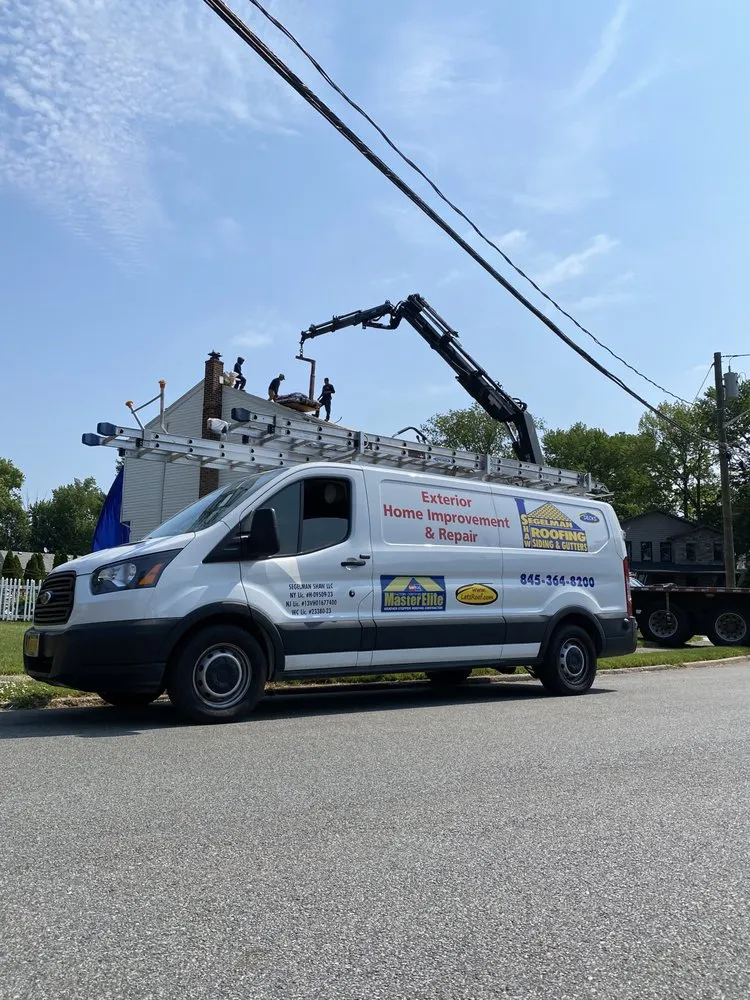 Slide of Segelman Shaw Roofing Siding & Gutters