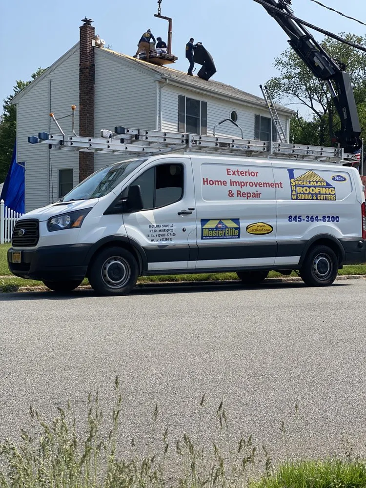 Slide of Segelman Shaw Roofing Siding & Gutters