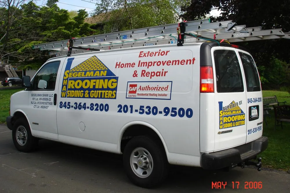 Slide of Segelman Shaw Roofing Siding & Gutters