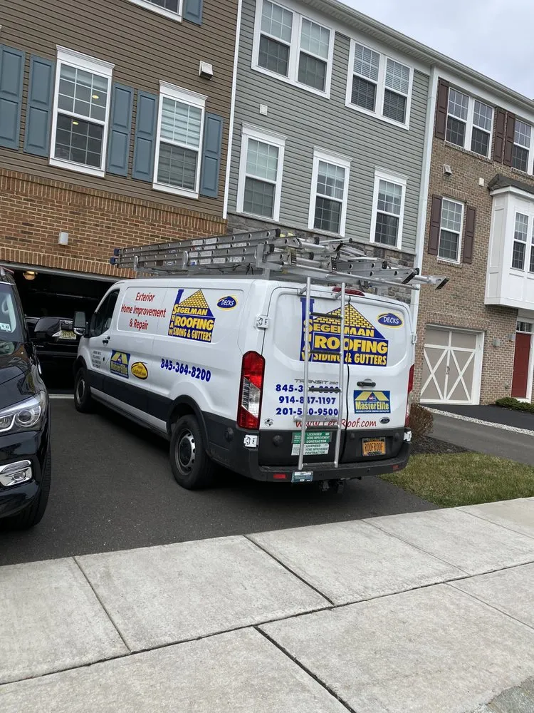 Slide of Segelman Shaw Roofing Siding & Gutters