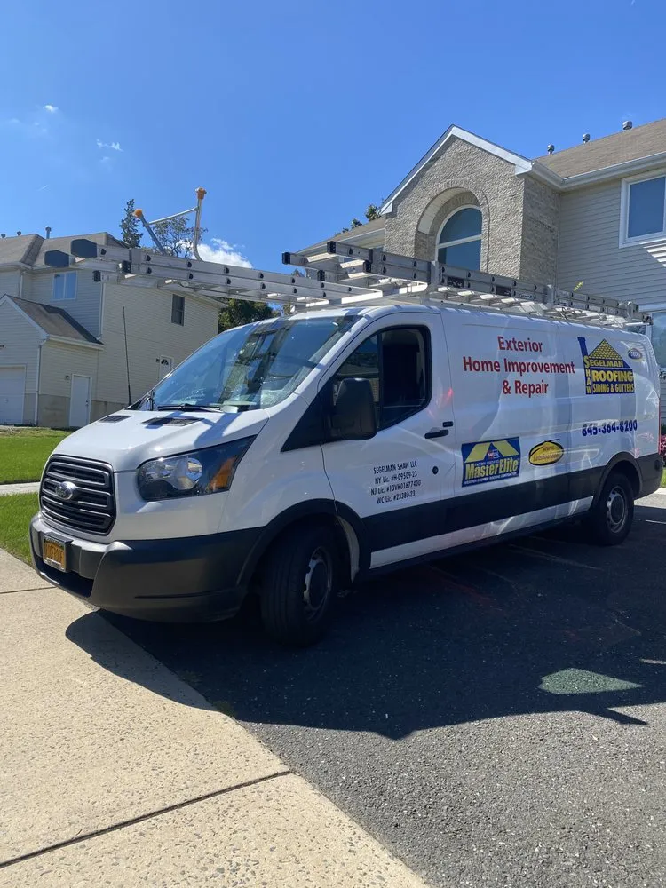 Slide of Segelman Shaw Roofing Siding & Gutters