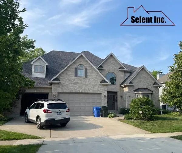 Slide of Selent Roofing