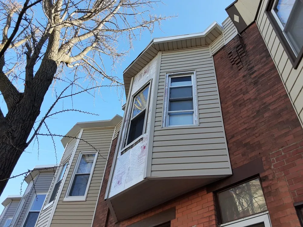 Slide of Selser roofing, siding, windows and doors