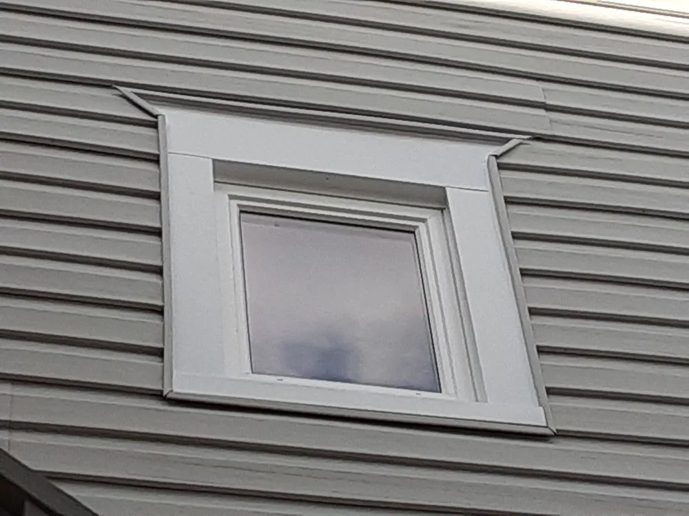 Slide of Selser roofing, siding, windows and doors
