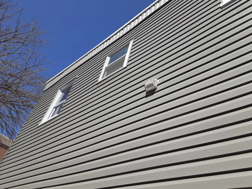 Slide of Selser roofing, siding, windows and doors