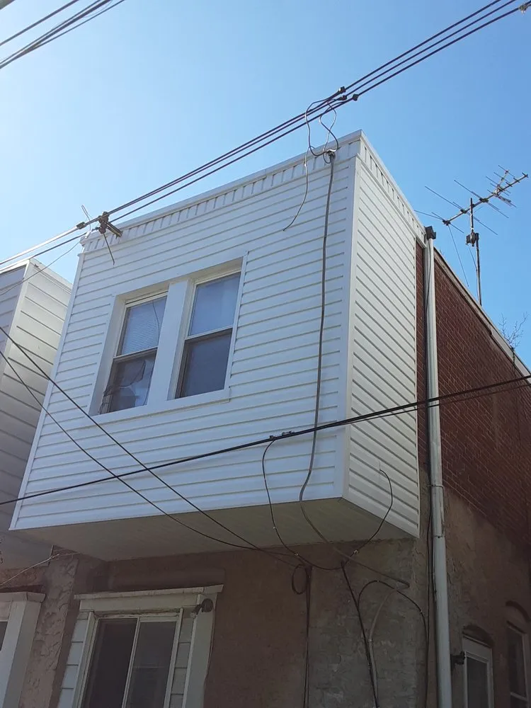 Slide of Selser roofing, siding, windows and doors