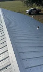 Slide of Sentinel Roofing