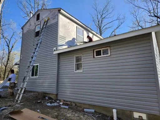 Slide of Serenity Roofing Solutions