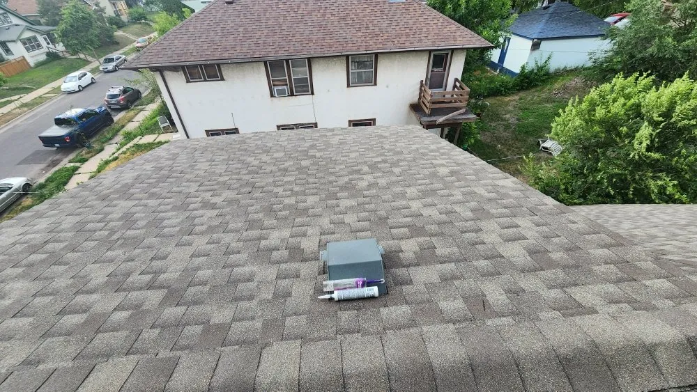 Reliable storm damage roof repair for residential properties in Hilltop, MN by Seus Guaman