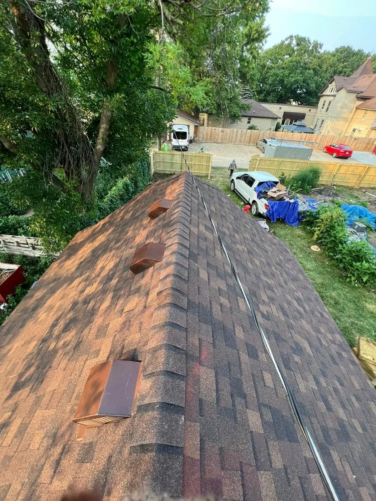 Professional roof leak repair near you in Hilltop, MN by Seus Guaman