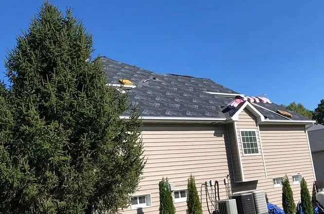 Slide of Sexton Roofs & Windows