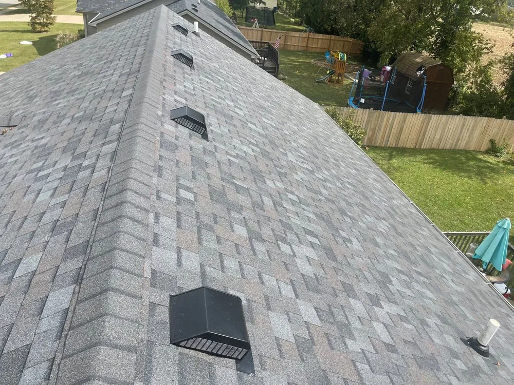 Slide of Sexton Roofs & Windows