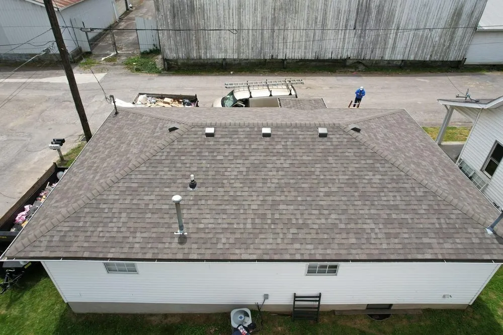 Slide of Sexton Roofs & Windows