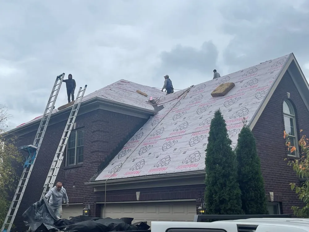 Slide of Sexton Roofs & Windows