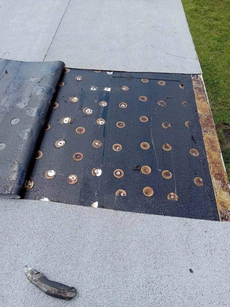 Slide of SGCI Roofing Division