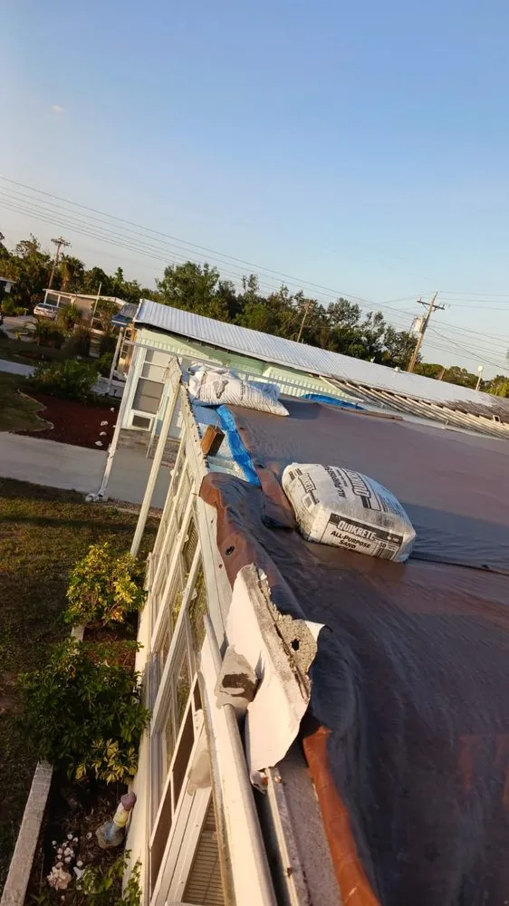 Slide of SGCI Roofing Division