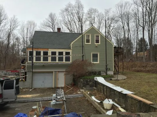 SGM Affordable Roofing & Siding Logo