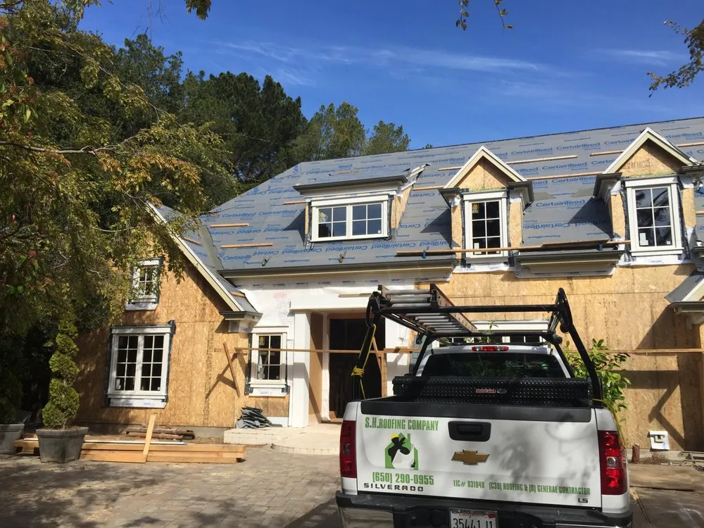 Slide of SH Roofing & Construction