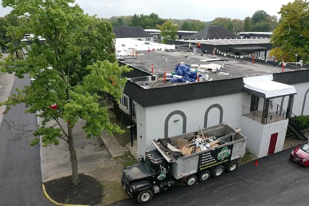 Slide of Shamrock Roofing