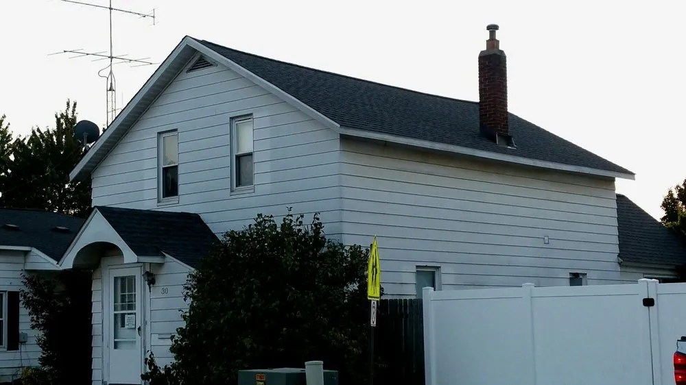 Slide of Sharp Roofing