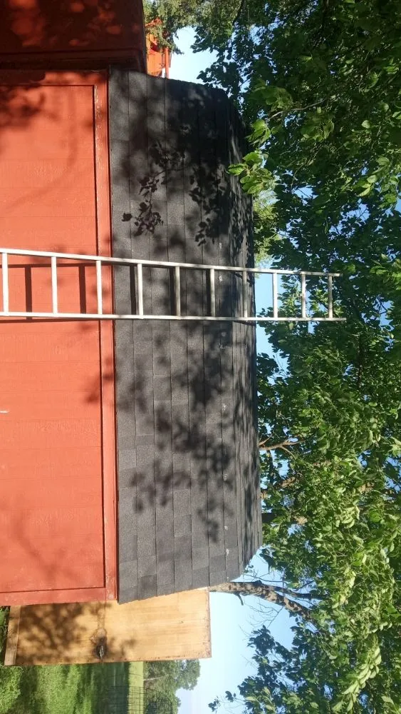 Emergency storm damage roof repair for residential properties in Cainsville, MO by Sharps Construction