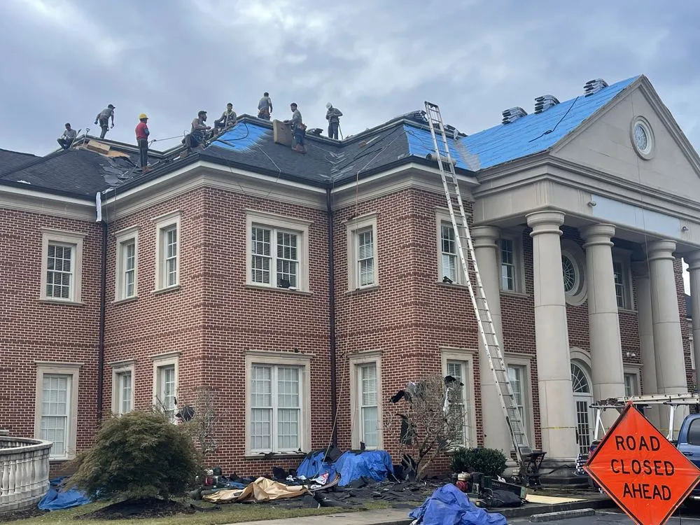 Slide of SharpTop Roofing