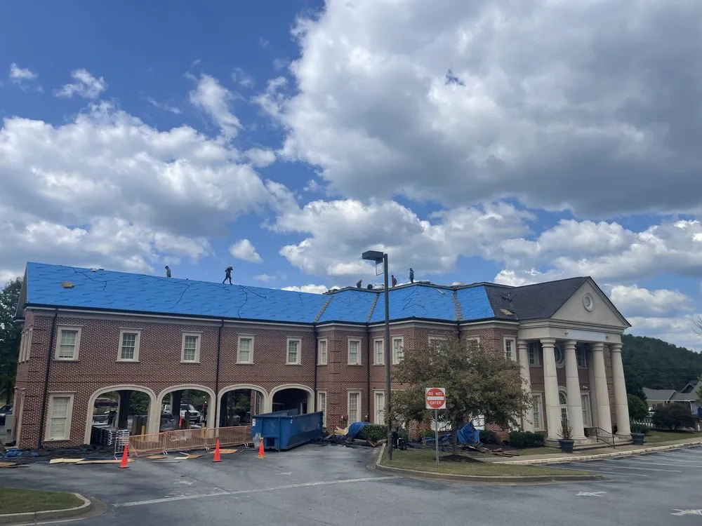 Slide of SharpTop Roofing