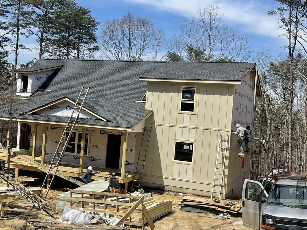 Slide of SharpTop Roofing