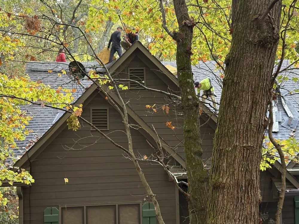 Slide of SharpTop Roofing