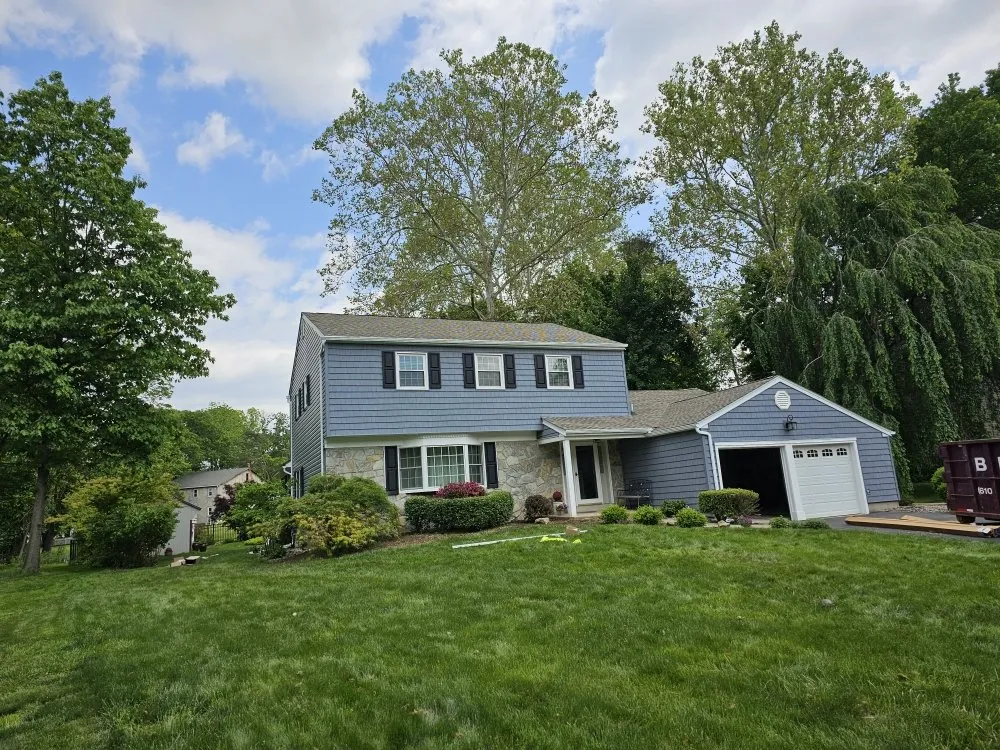 Slide of Shaughnessy Roofing