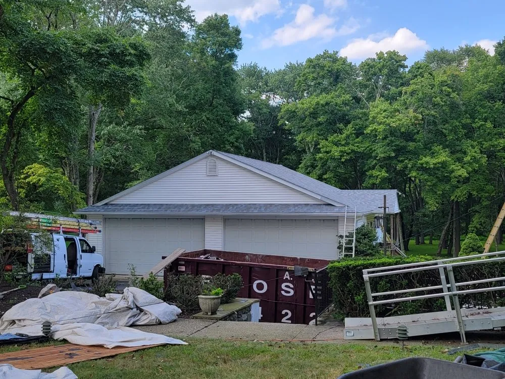 Slide of Shaughnessy Roofing