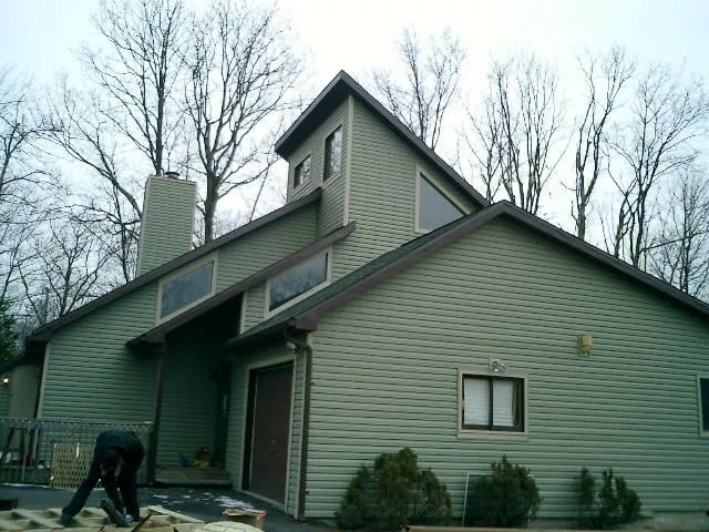 Slide of Shaw Roofing & Construction