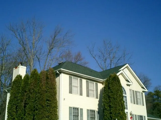 Slide of Shaw Roofing & Construction