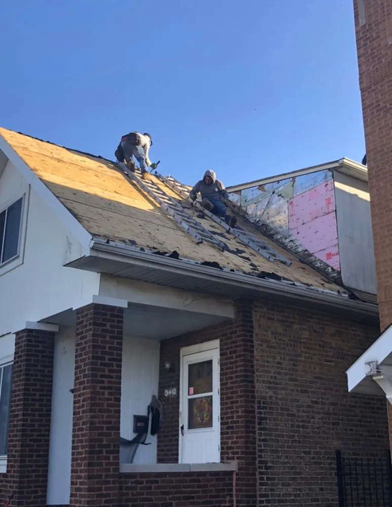 Slide of Shawns Roofing