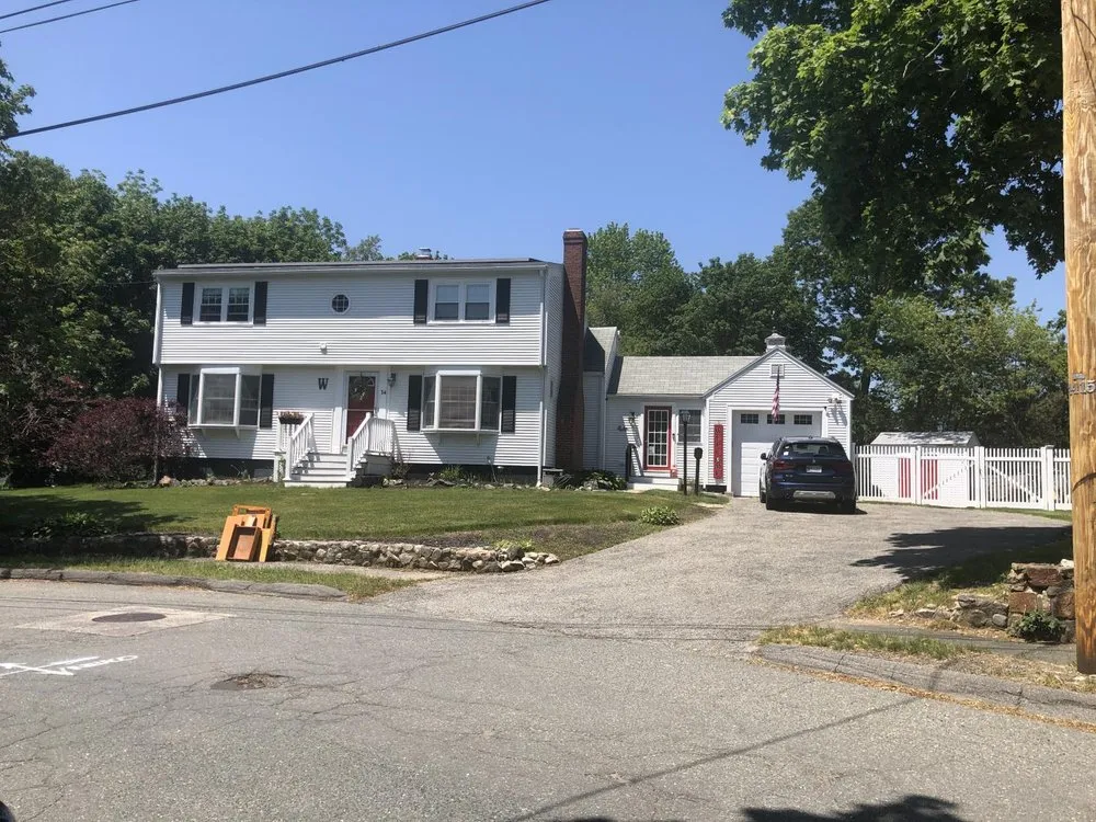 Slide of Shea Roofing Company