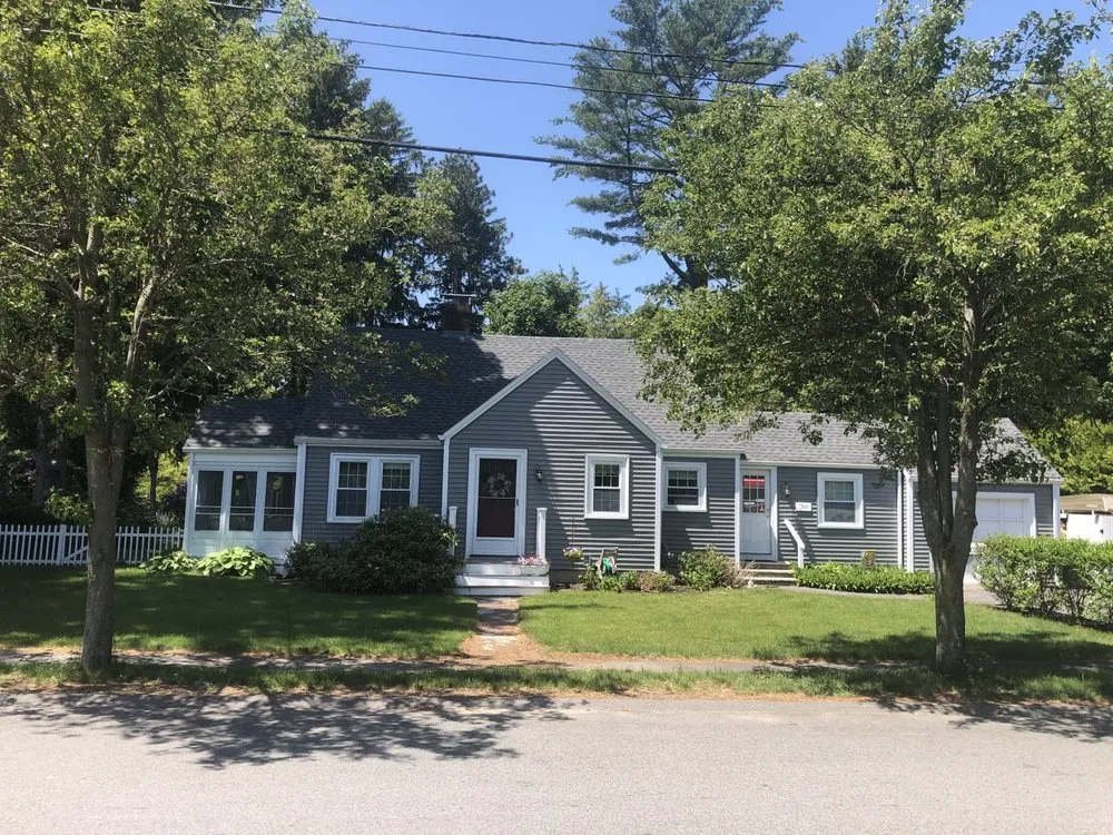 Slide of Shea Roofing Company