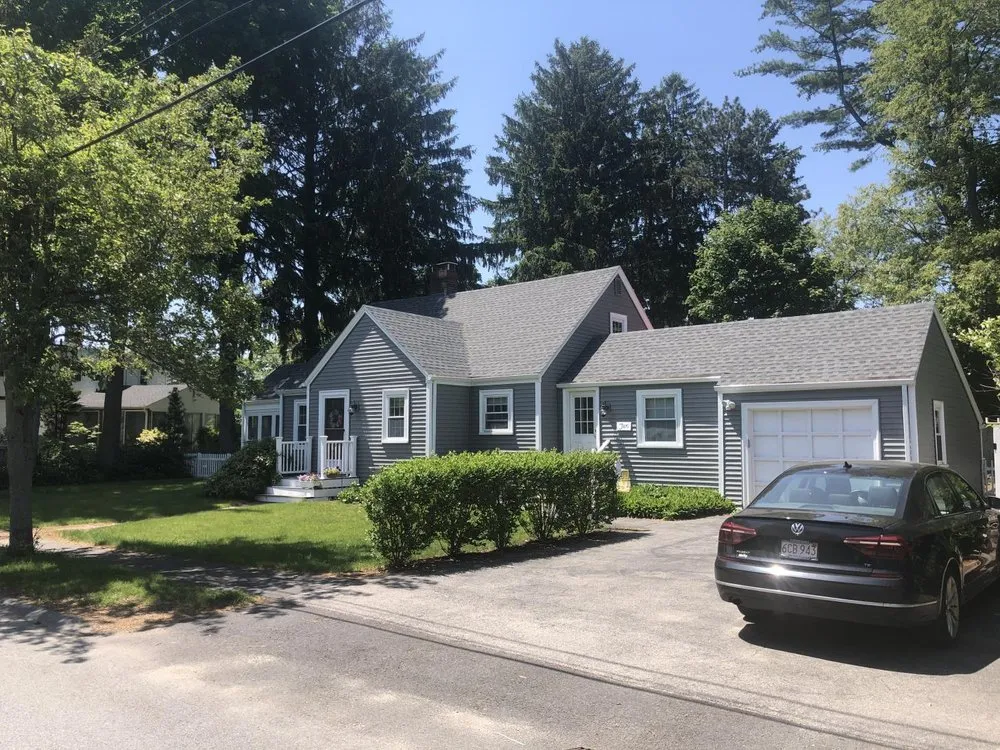 Slide of Shea Roofing Company