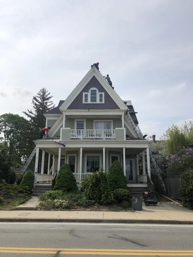 Slide of Shea Roofing Company
