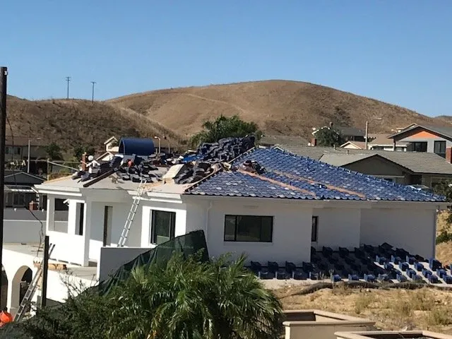 Slide of Shelter Roofing and Solar