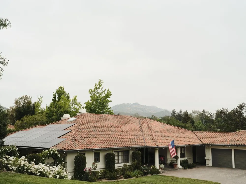 Slide of Shelter Roofing and Solar