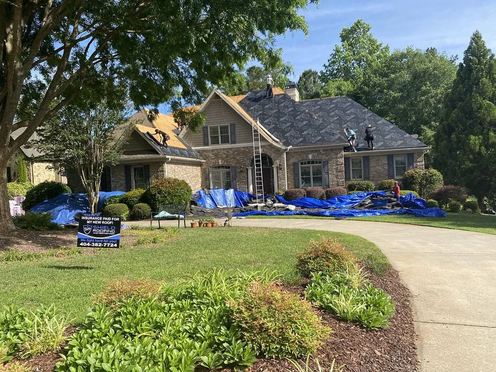 Slide of Shield Roofing and Restoration