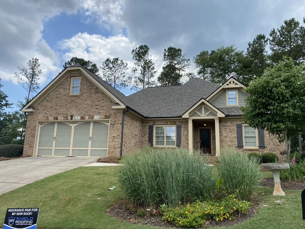 Slide of Shield Roofing and Restoration